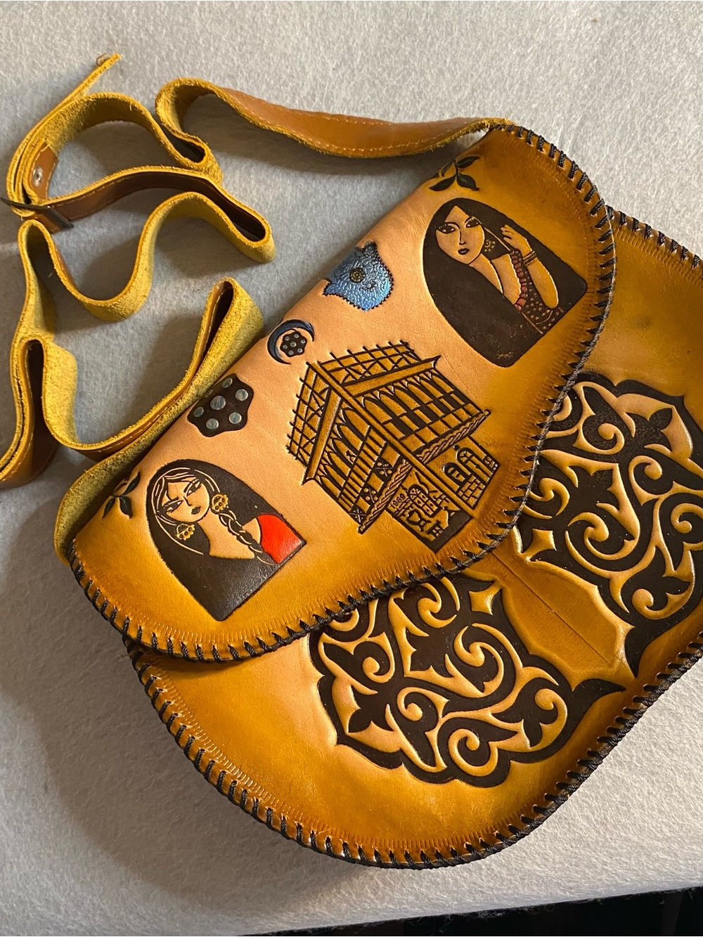 Handcrafted Yellow Leather Crossbody Bag with Artistic Carvings